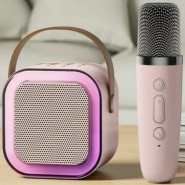 Мини караоке Bluetooth колонка с 1 микрофоном K12 розовая 2159₽